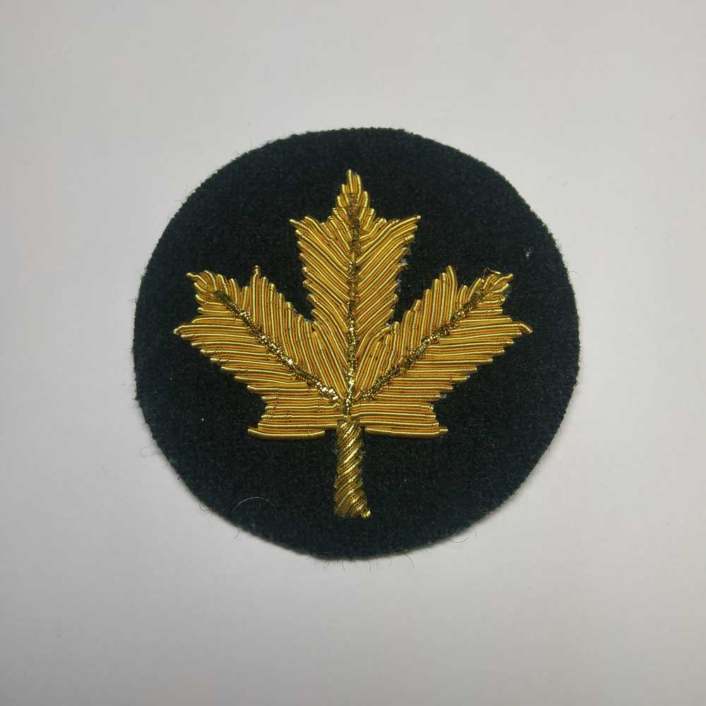 Turnback Tacks: Maple Leaf, Gold with Green Backing
